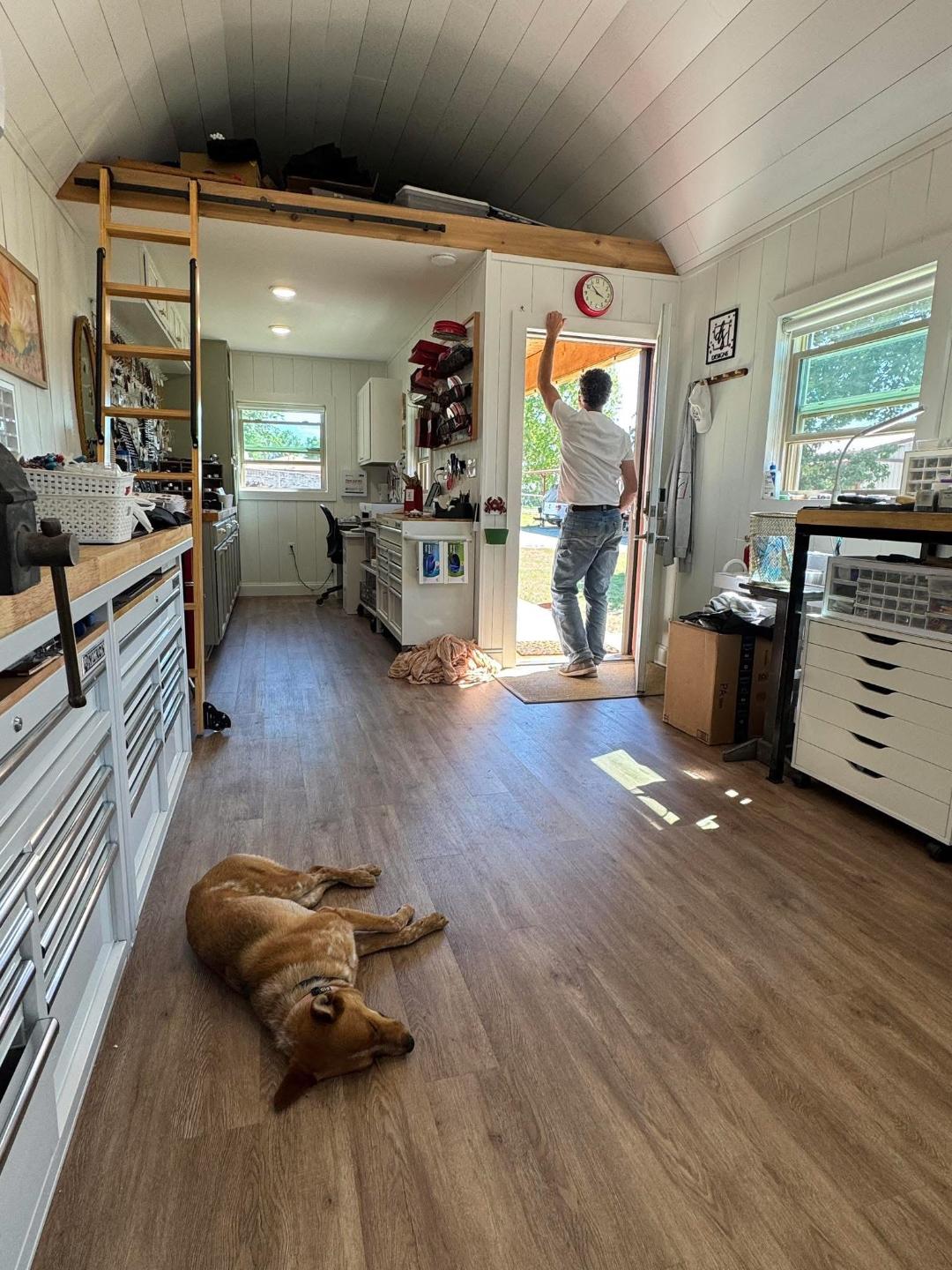 Husband Kenny and rescue dog Tulsa Anne resting after Dione works them